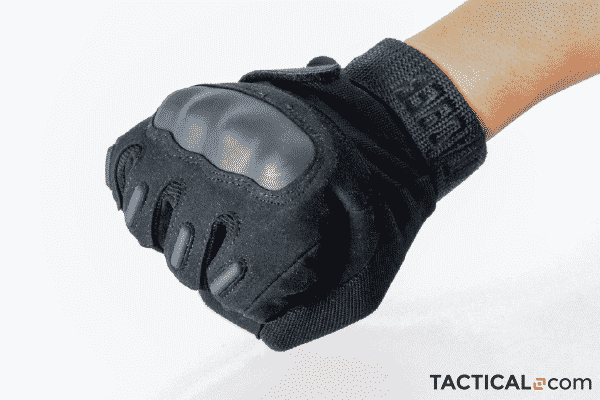 Person making a fist while wearing the TAC9ER tactical gloves 